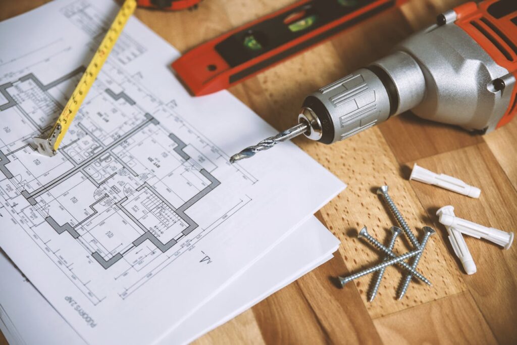 screwdriver with home building plans